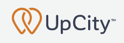 UpCity logo with an orange heart symbol above the 'p' in 'UpCity' and a trademark symbol.