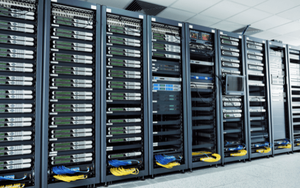 A row of server racks filled with network equipment and servers, featuring structured blue and yellow cabling in a modern data center.