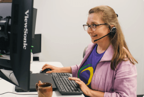 Woman performing customer service as Net Friends