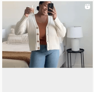 Cover photo of a video featuring a woman in a white cardigan and jeans taking a selfie video with a drink