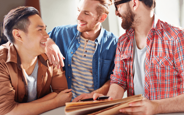 Three guys laughing and talking