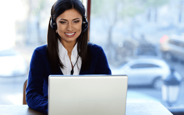 Woman on a laptop providing customer service