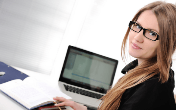 Woman studying at a laptop