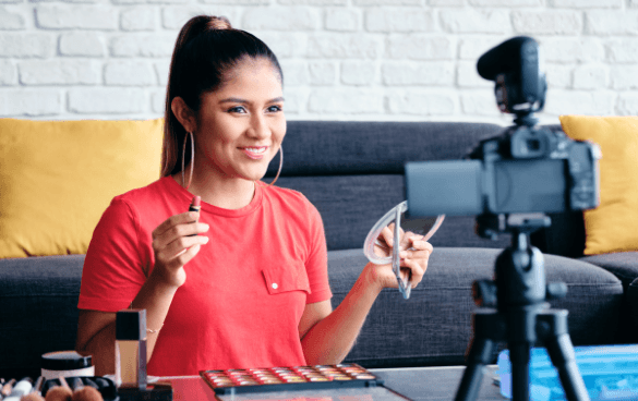 Woman sitting in front of camera