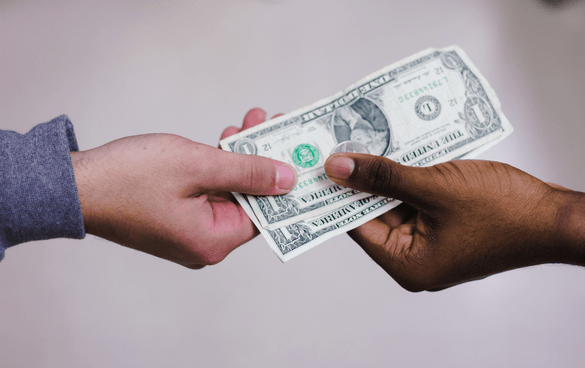 two men exchanging money