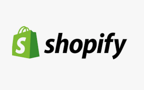 Shopify logo with a green shopping bag icon and the word 'shopify' in black lettering.