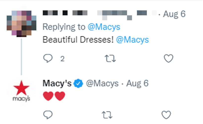 Macy's responding positively to a person on Twitter complimenting its dresses