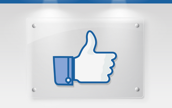 Icon of a hand giving a thumbs up, commonly recognized as a 'like' symbol on social media, displayed on a clear plaque.