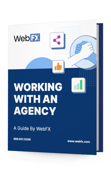 A digital rendering of a standing booklet titled 'WORKING WITH AN AGENCY - A Guide By WebFX' with icons representing a handshake, a thumbs up, and a bar chart on the cover.