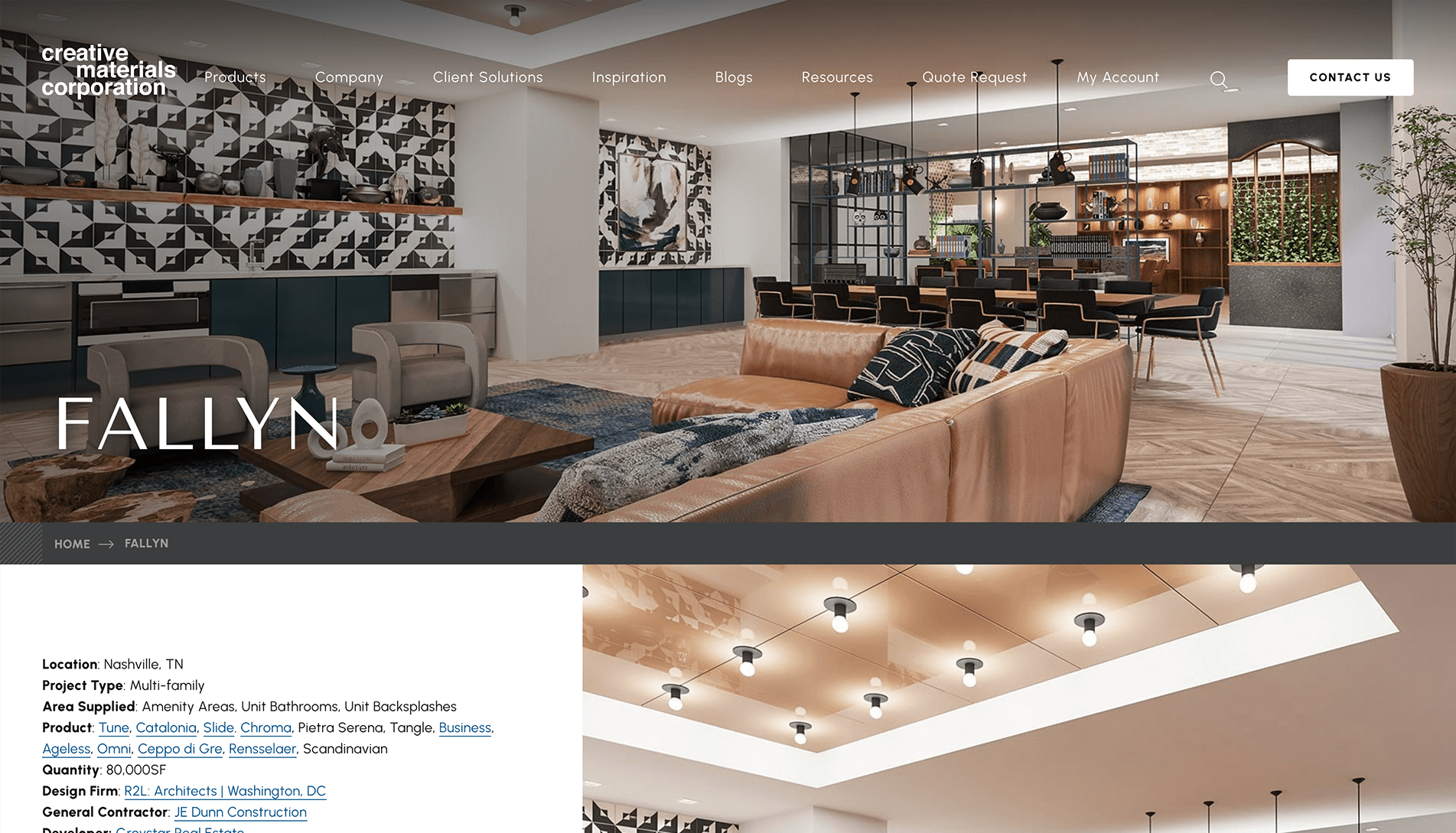 Modern interior of a multi-family residential building with tan leather sofas, black chairs, geometric wall tiles, artwork, and pendant lighting.