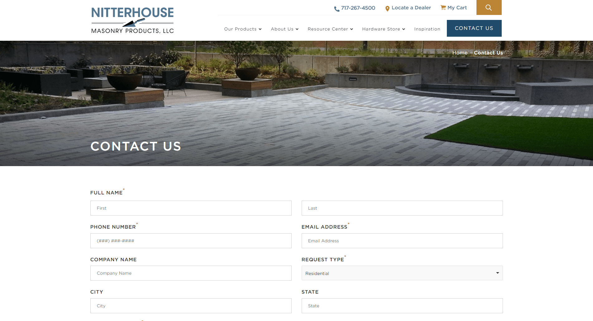 Screenshot of Nitterhouse Masonry Products contact page with a form to fill out personal details and a background showing an outdoor paved area with seating and planters.