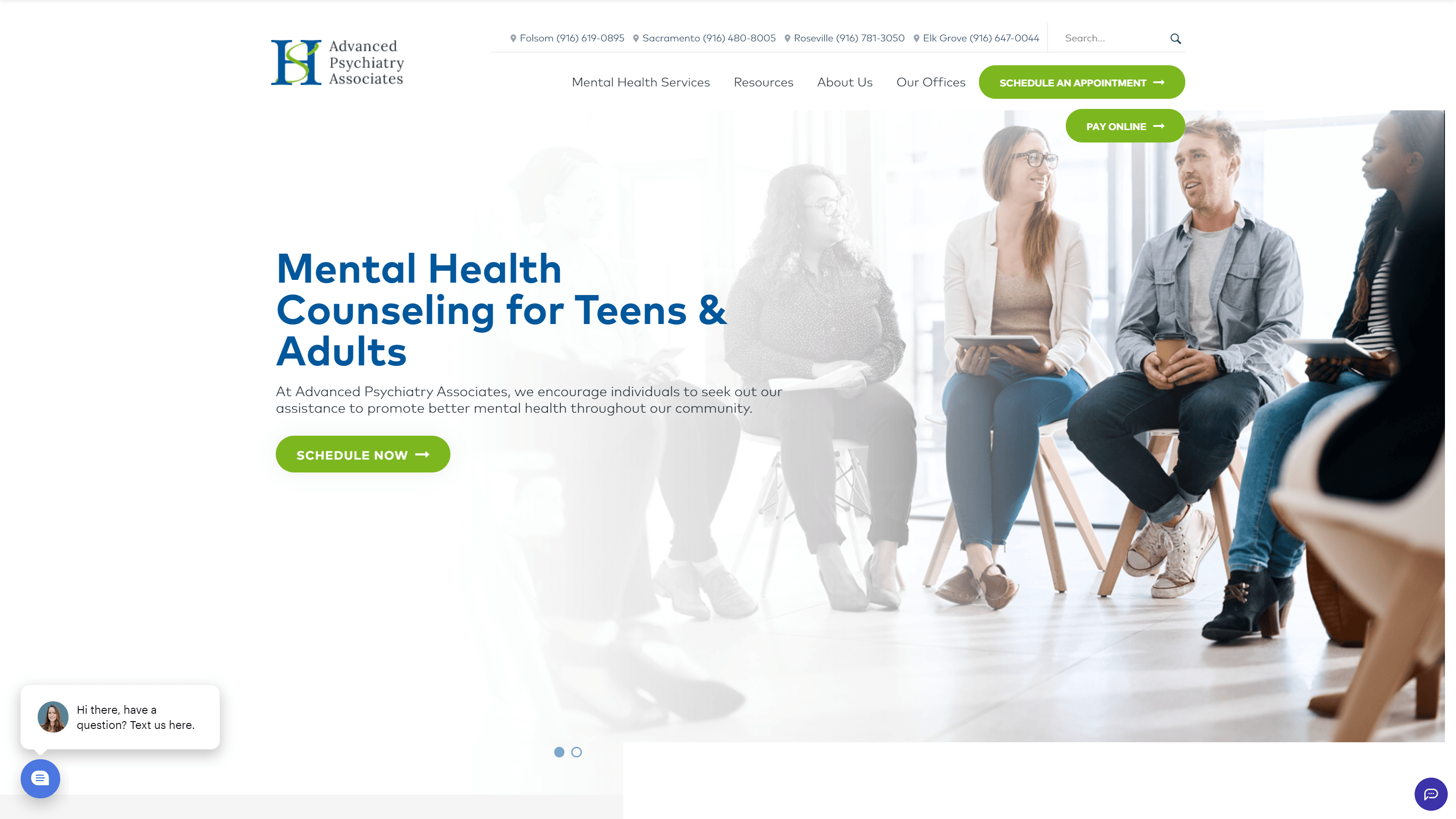 A website interface for Advanced Psychiatry Associates featuring a group of adults in a counseling session, with navigation options and a headline promoting mental health counseling for teens and adults.