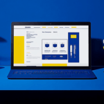 Blue and yellow desk with laptop