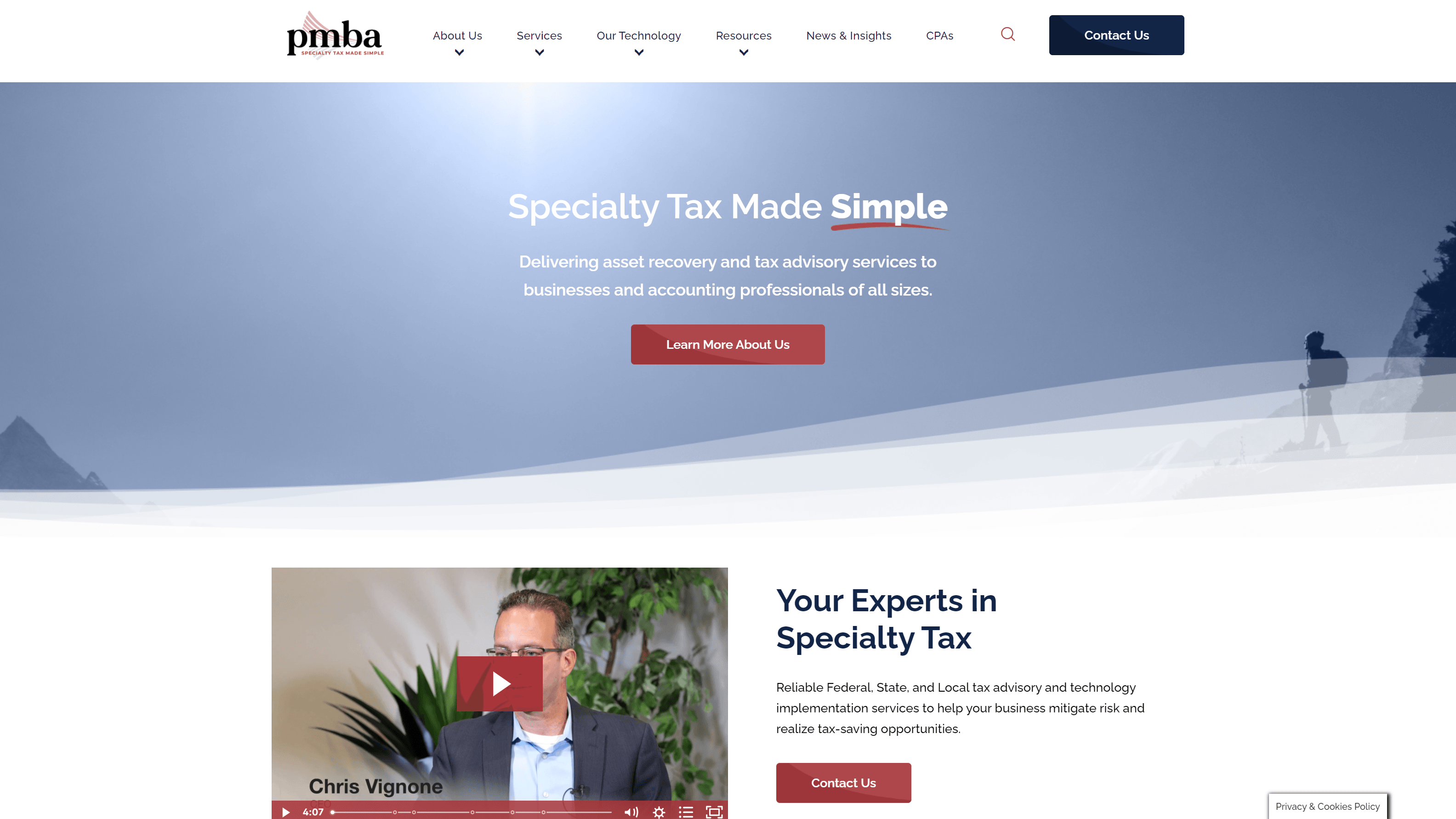 Screenshot of a website homepage for tax advisory services, featuring a navigation bar, a banner with the text 'Specialty Tax Made Simple,' a snowy mountain background with a person's silhouette, a video thumbnail labeled 'Chris Vignone,' and a section titled 'Your Experts in Specialty Tax' with service descriptions.