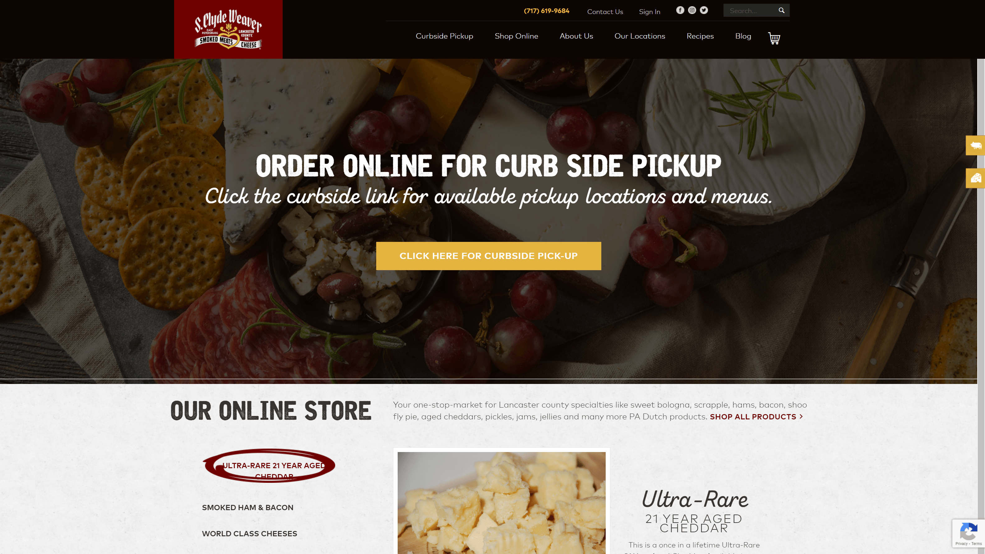 Screenshot of S. Clyde Weaver's website featuring a banner for online curbside pickup and sections for smoked ham, bacon, and world-class cheeses, including an advertisement for Ultra-Rare 21 Year Aged Cheddar.