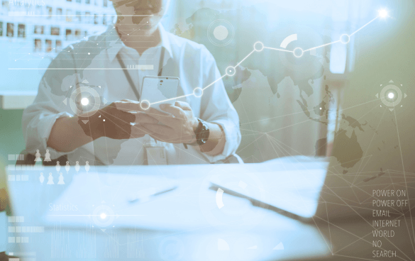 A professional in a white shirt using a smartphone with a smartwatch on the wrist, sitting at a desk with papers, overlaid with digital graphics symbolizing global connectivity and technology.