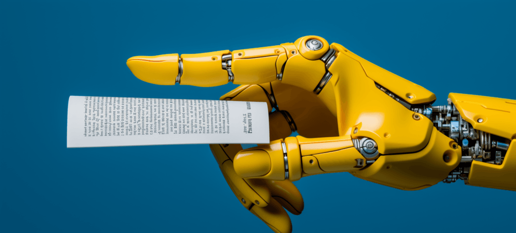 Yellow robot hand holding a small piece of paper