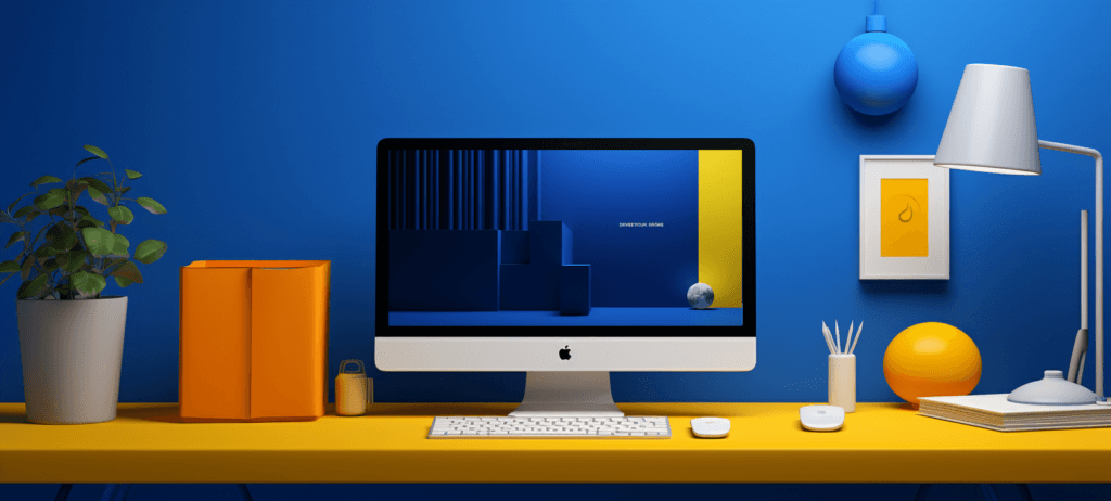 Desktop computer sitting on a yellow table with a blue wall behind it