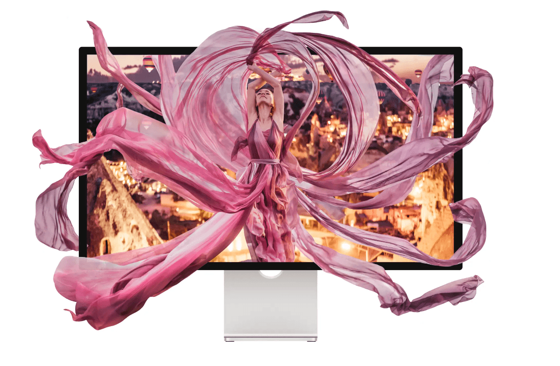 Picture on a computer screen of a woman in a pink flowy dress