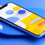 A smartphone with a colorful abstract design on the screen, surrounded by matching geometric shapes on a blue background.