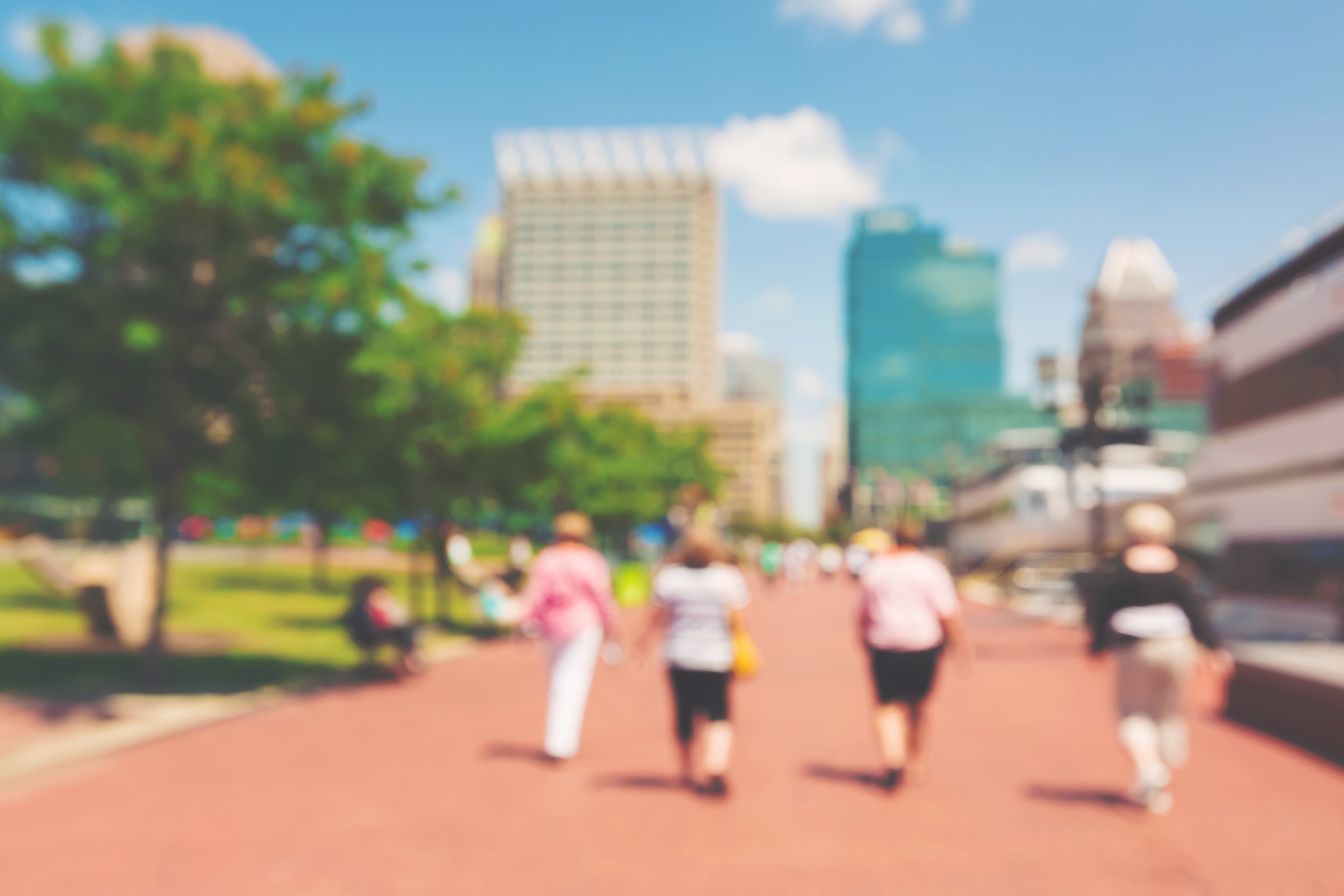 People walking at Inner Harbor in Baltimore