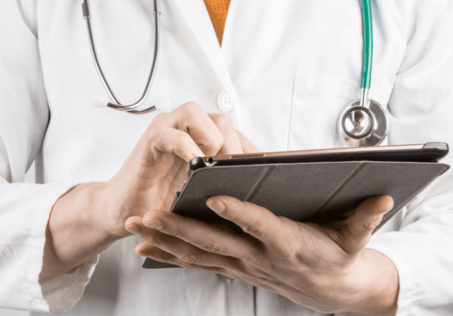Doctor with a tablet