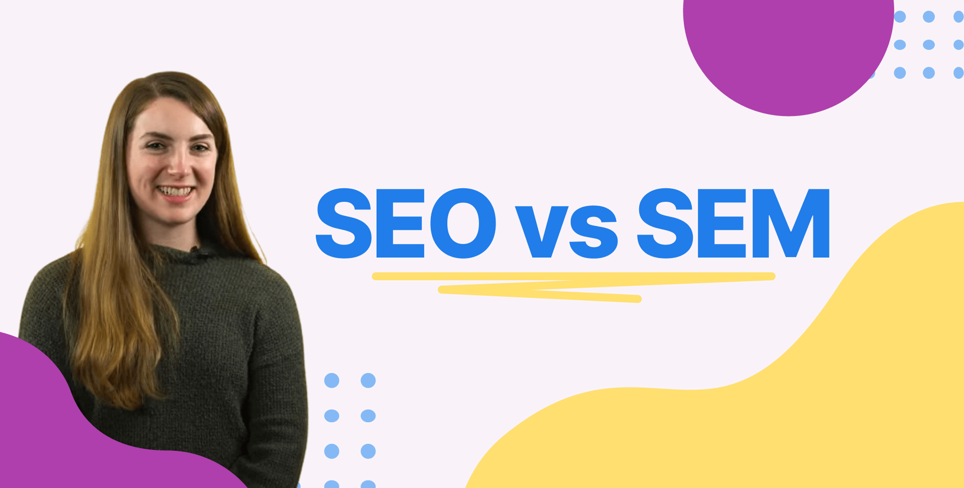 Woman wearing dark green sweatshirt and smiling for a video on SEO vs. SEM, what is the difference and do you need both.
