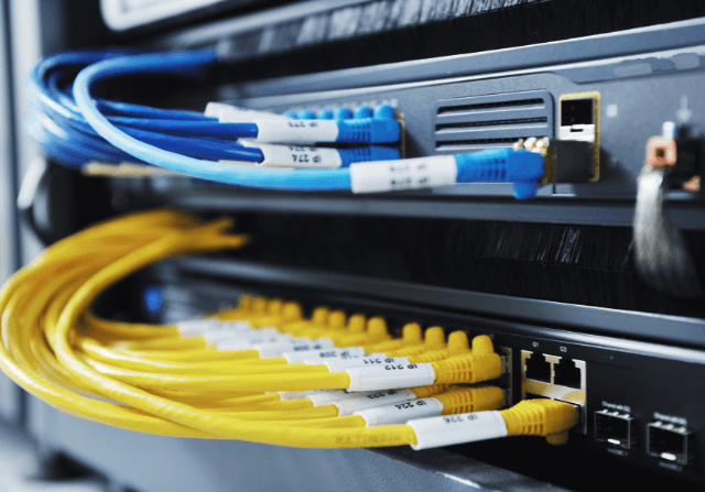 Blue and yellow server room wires