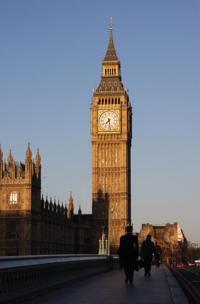 Business men walking near Big Ben in London