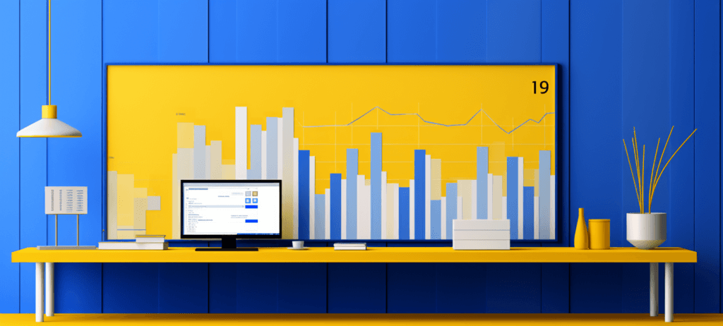 Graph of data sitting behind a laptop on a desk