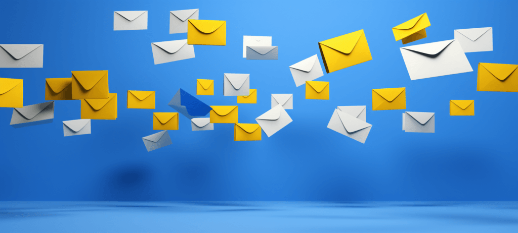 yellow and white envelopes flying in the air