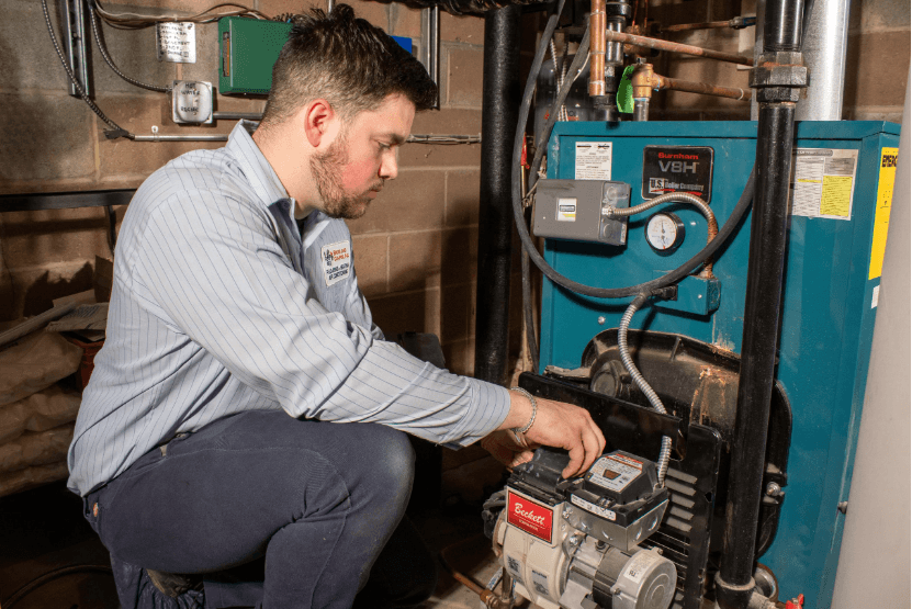 Man repairing an HVAC unit