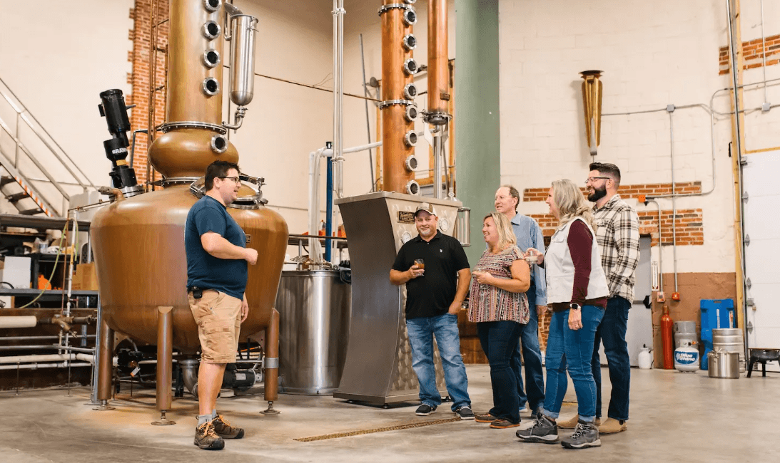Group of people doing a tour at a brewery