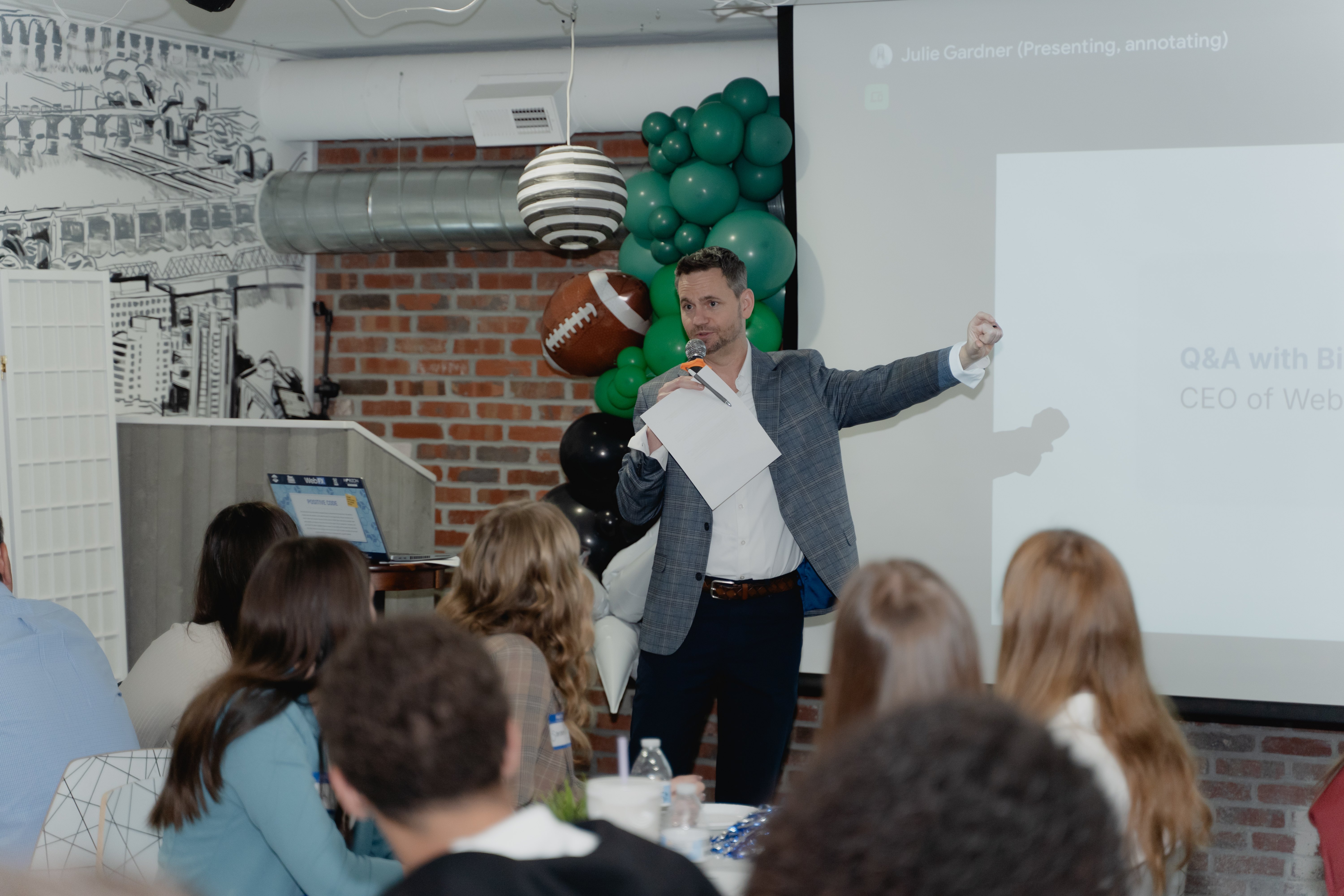 CEO Bill presenting to a group of people