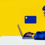 Man typing on a laptop
