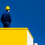 Three men looking over a construction site