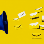 Megaphone with emails flying from it