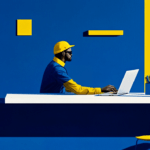 A metal fabricator working on laptop