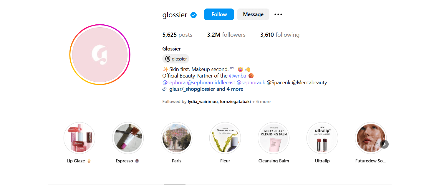 Glossier Instagram bio crosslinking example