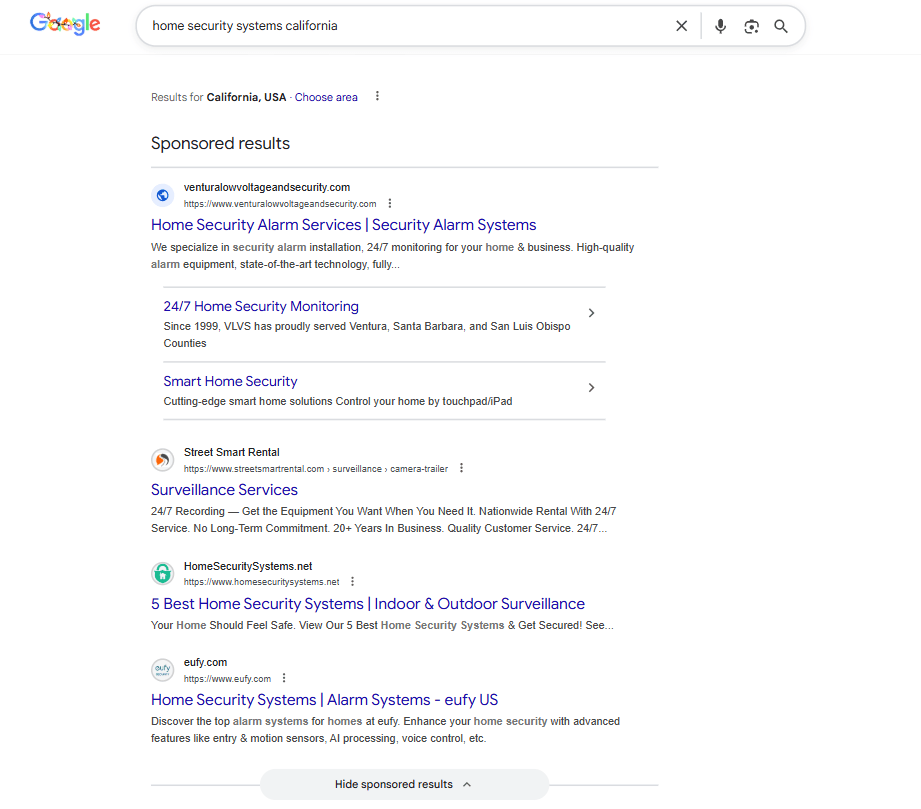 PPC results for "home security companies in California" now with a drop down