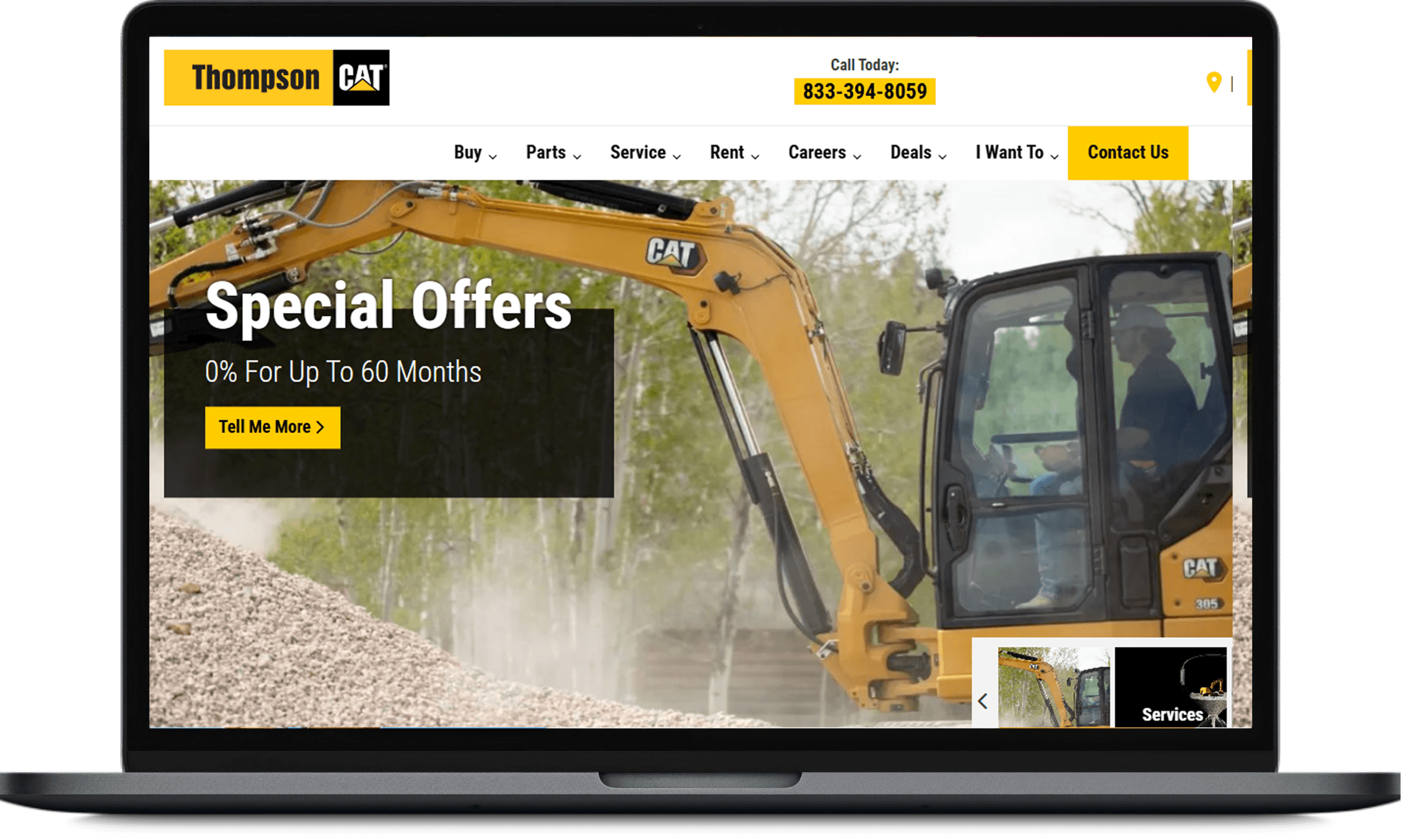 Thompson Tractor website on a laptop